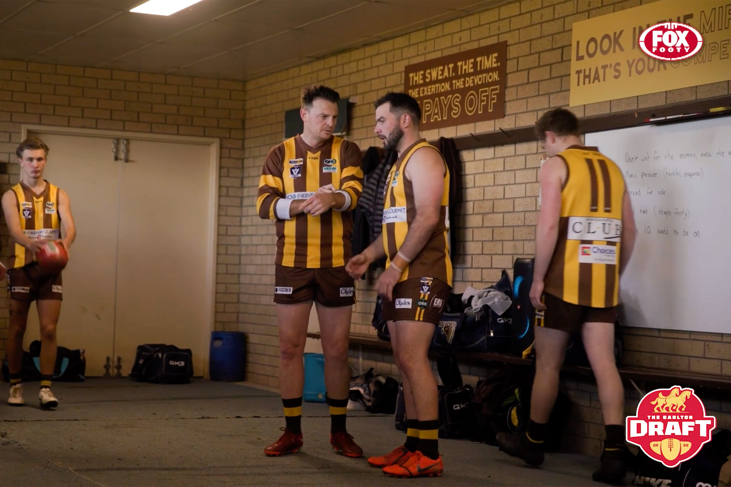 Brendon Goddard ex AFL player having a pre match chat with a local